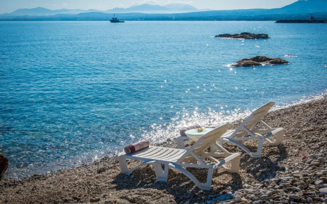 Exclusive Seaside Retreat with Shared Pool & Private Beach Access