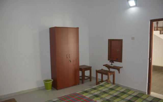 Green White Deluxe Room