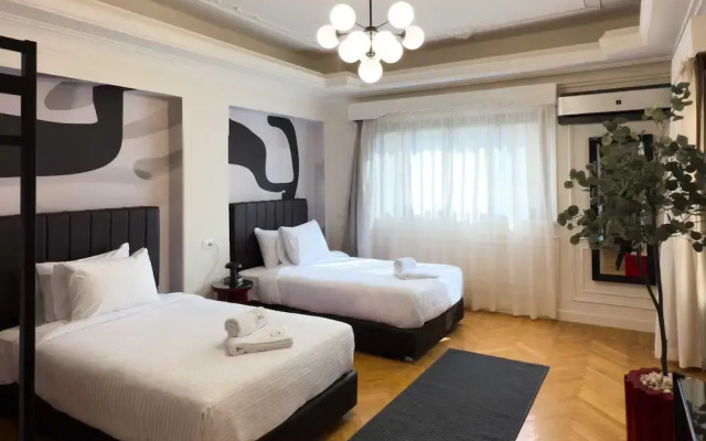 The 2bdr Crimson Crib @ The Heart Of Heliopolis