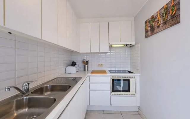 Apartment Overlooking the Green Surroundings