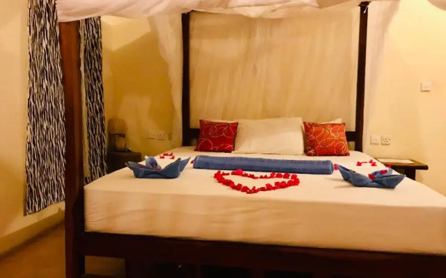 Msafini MangoTop Roof Hotel