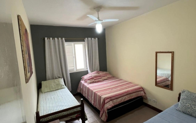 Apt TOTA 3 min Praia grande piscina e churrasqueira