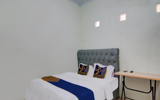 Hotel O Awi Stay Syariah Near SIMPANG KAWASAN INDUSTRI WILMAR PELINTUNG – Guest Rooms – Pelintung