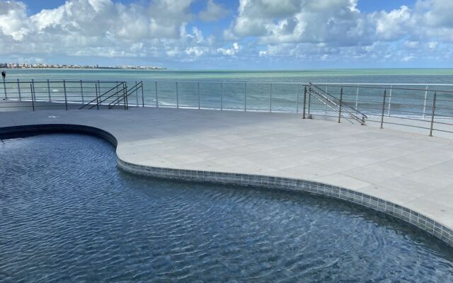 Bela Hospedagem - Vista piscina e mar