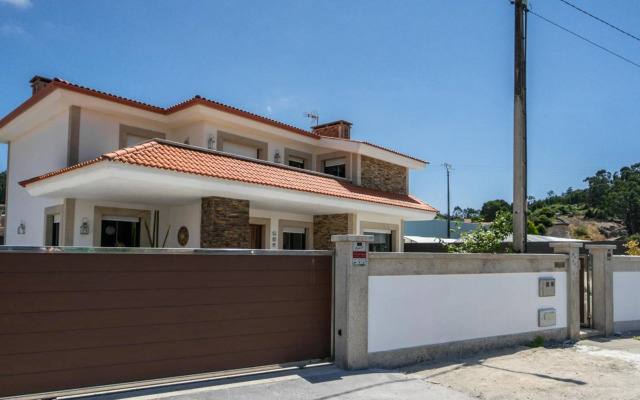 Villa con piscina a pie de playa