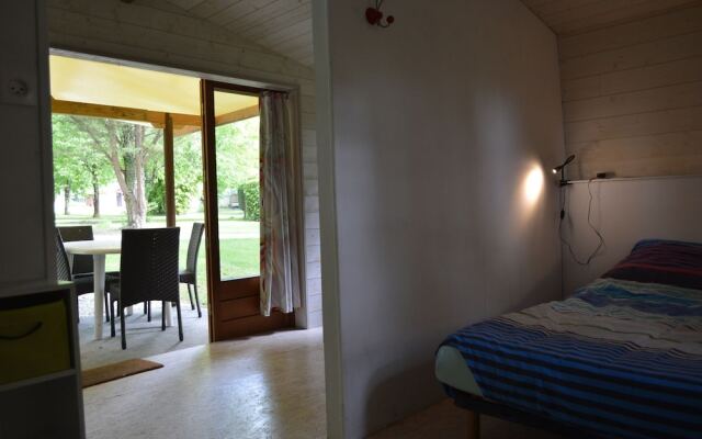 Camping Le Petit Lion - Lodges Bois