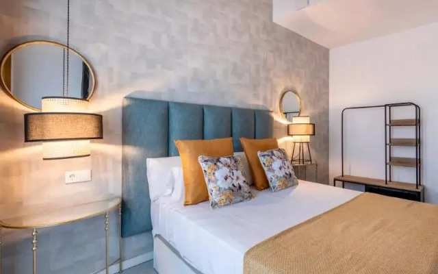 Apartamentos Puerta Elvira Suites 3000