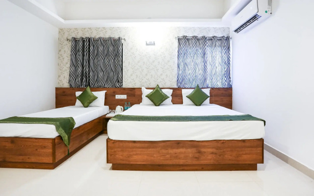 Treebo Comforts Inn, University Road Deralakatte