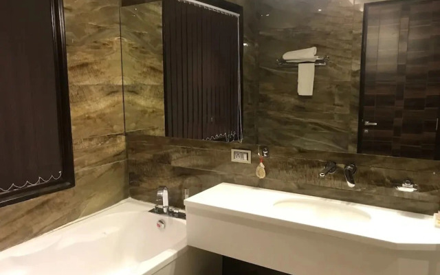 C Pearls Hotel  Banque by OYO Rooms