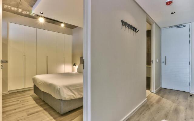 One Bedroom With Balcony and City Views
