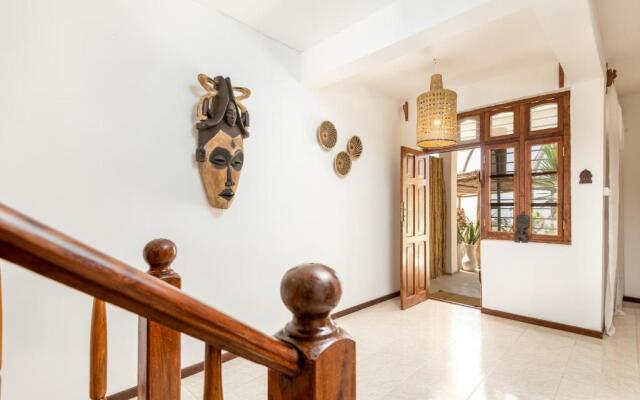 KIMA Serviced Beach House & Suites