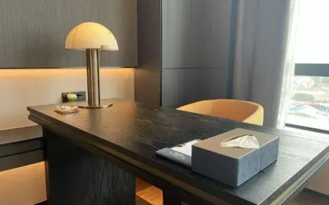 BaiLiQuanZhiJiuDian Hotel (Jiangmen Binjiang Sports Center)