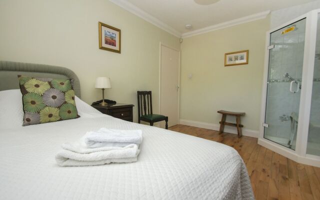 Dean Court Bungalow Parking by Brighton Holiday Lets