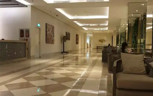 Studio Room at Cosmy Orchard Apartment