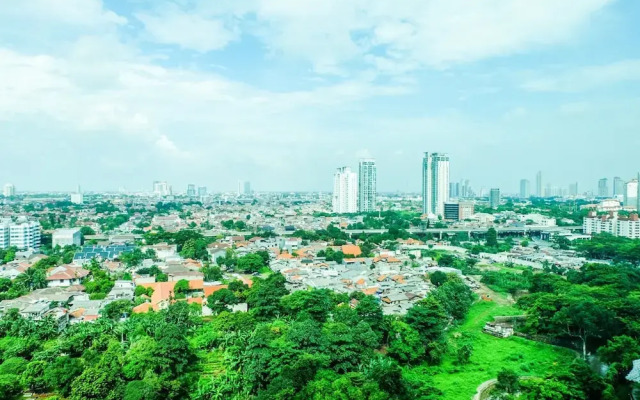 Cozy and Elegant 2BR Kemang Village Apartment By Travelio