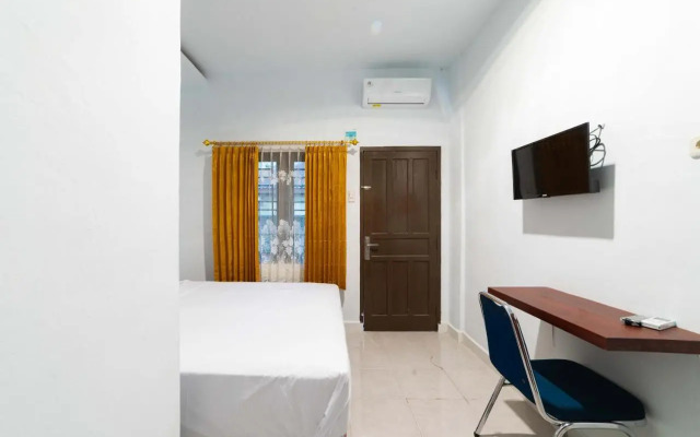 Kost M25 Hostel by Reddoorz