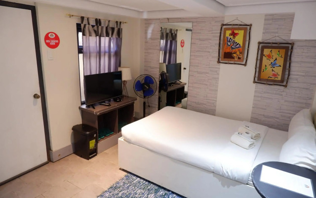 OYO 492 Sunset View Ridge Residences