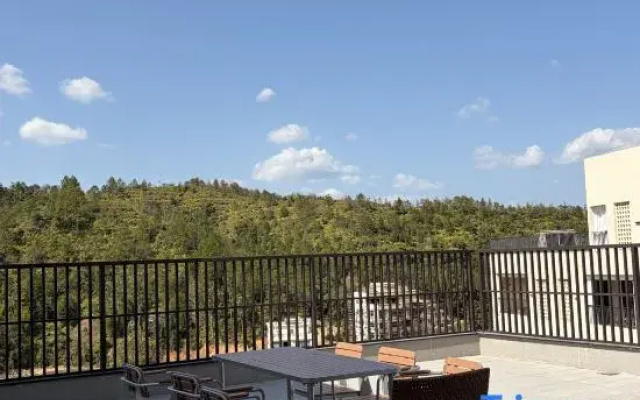 Jiuheyueyuan Wenquan Forest Resort Hotel