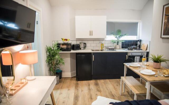 Derby's Beach Suites by Sasco Apartments