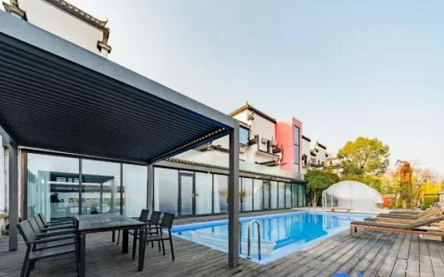 Grand Travel Lodge DESIGN Boutique Hotel(Xixi Nangu Village)