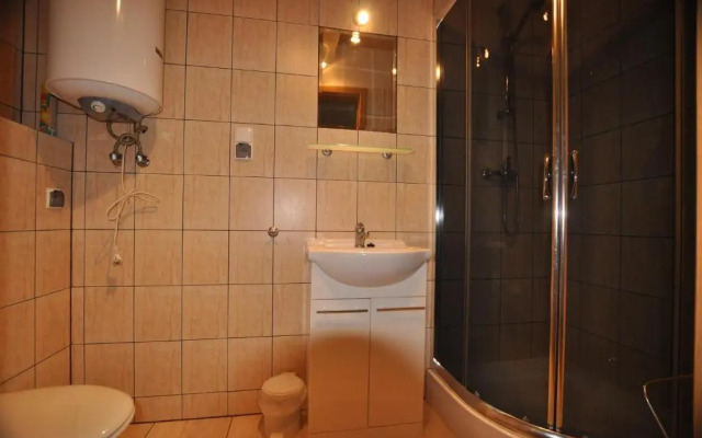 Apartament pod Dębami