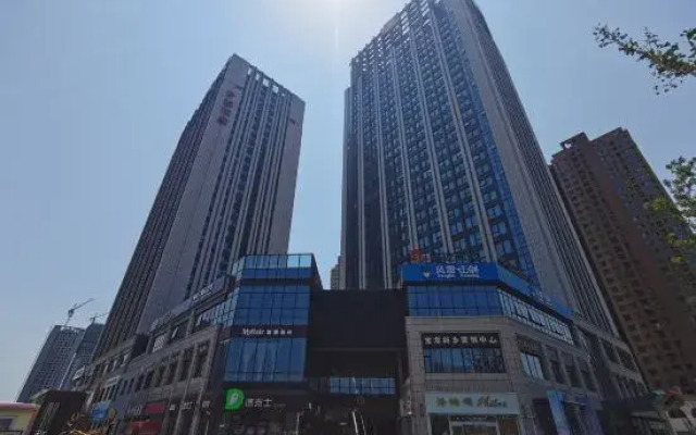 Moshanghuahuashui Intelligent Hotel (Baolong Square Branch)