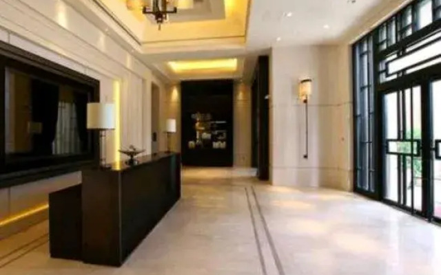 City Xinjia Apartment Hotel