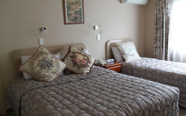 Asure Camelot Arms Motor Lodge