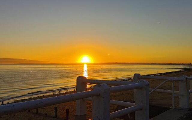 bord de mer, chalet en bois avec tandem