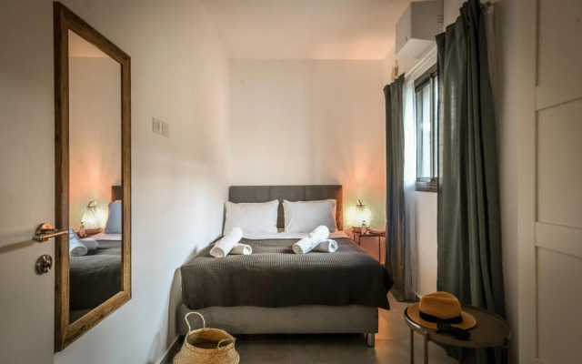 Stylish 2BR Apartment with Balcony and Urban View