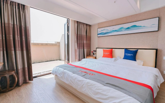 Junyi Chain Hotel (Taixing Wuyue Plaza Taixing Park Branch)