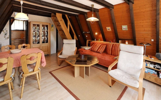 Wooden Chalet with Terrace near Swimming Lake