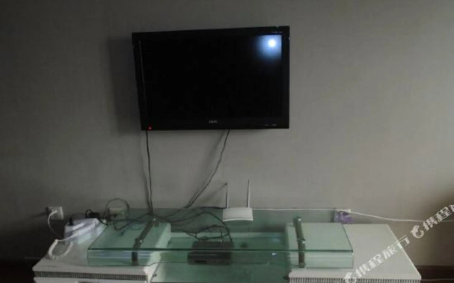 Qingqing Wojia Hotel Style Apartment