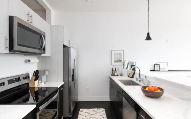 Flexhome Skywalk to Fiserv U2 RooftopGymParking
