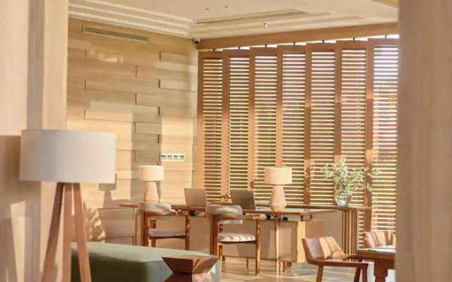 Signature By M Village Beachfront Hotel