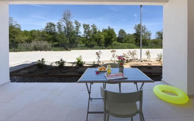 Residence Marina di Bravone - appartement 8 personnes RDC N5-6