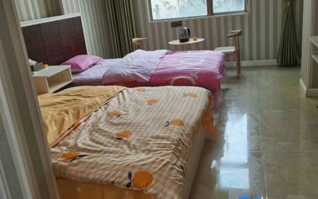 Wanxing Apartment Hotel