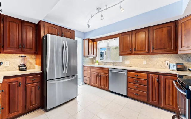 Coastal Surfside by Beachside Management