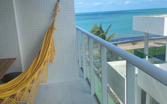 Pé na areia do Caribessa - Branco Haus