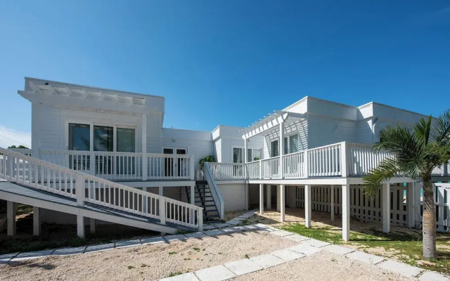 Secluded Luxury: New Beachfront Home With Pool