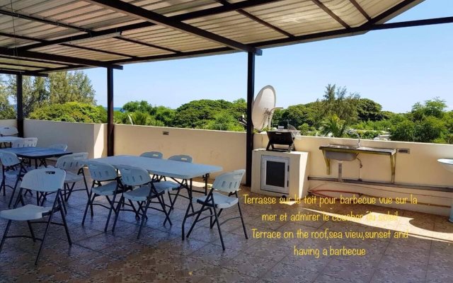 Apartment With 2 Bedrooms in Flic en Flac, With Wonderful sea View, Shared Pool, Furnished Garden