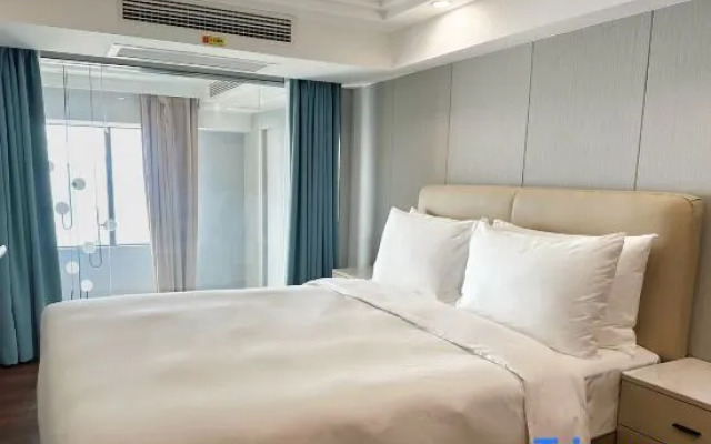 Xiaocheng International Apartment Hotel