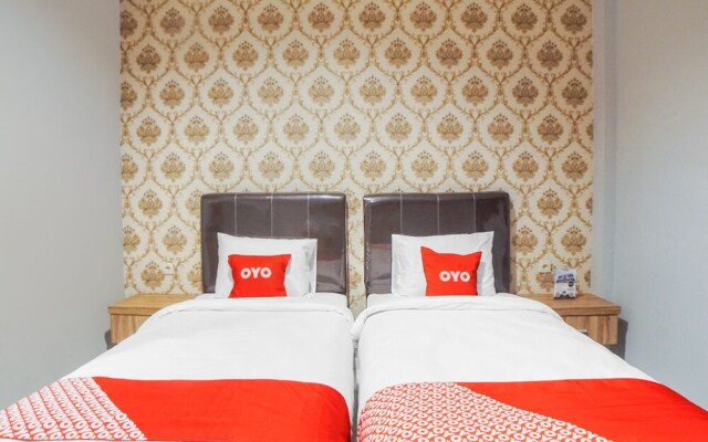 Super Oyo Capital O Papakoel Hotel & Cafe
