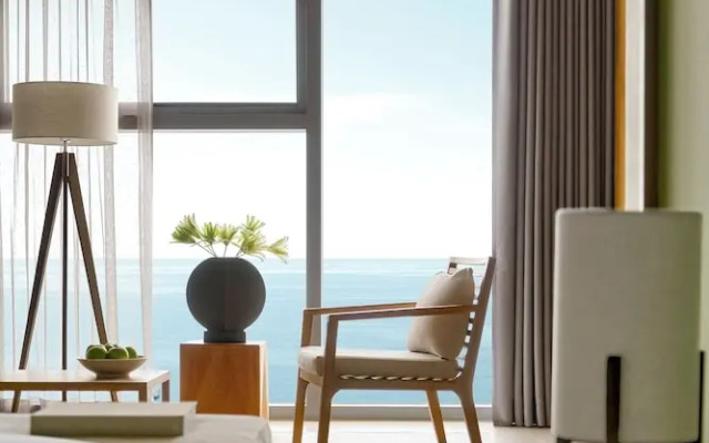 Signature By M Village Beachfront Hotel