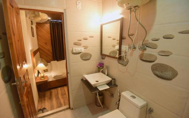 Swiss Cottage by Dumnu Homes next to Kangna Ranaut's house