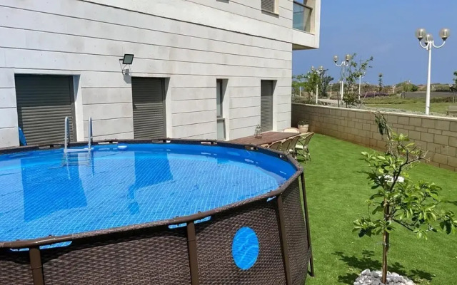 Deluxe Apartment with Private GardenArea