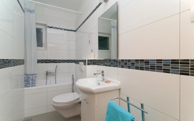Awesome Home in Kucine Solin with Hot Tub, WiFi & 7 Bedrooms