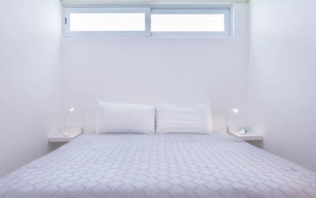 Contemporary Design Oceana 422 Playa del Carmen Condo by RedAwning