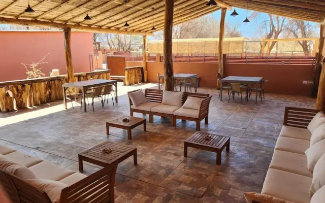 Peumayen Atacama / Hostal & Cabaña