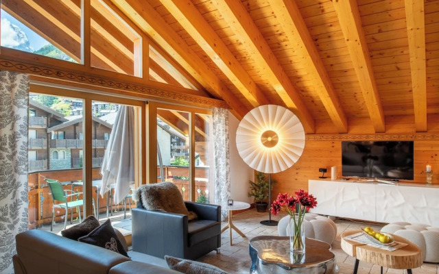 Mountain Exposure Luxury Chalets & Penthouses & Apartments